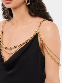 Store Top noir avec bretelles ornées de la chaîne signature